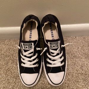 Chuck Taylors. Shoreline style. Can wear with or without socks.